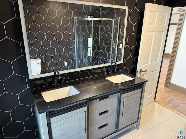 27139 US Highway 81, Freeman, SD 57319 - bathroom with double vanity and tile patterned flooring