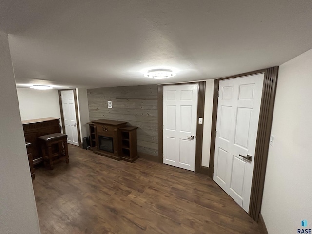 27139 US Highway 81, Freeman, SD 57319 - unfurnished living room featuring wooden walls and dark wood-type flooring