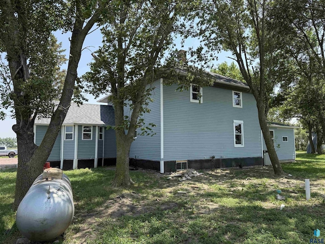27139 US Highway 81, Freeman, SD 57319 - view of home's exterior featuring a yard and a chimney