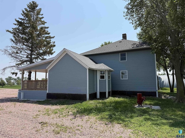 27139 US Highway 81, Freeman, SD 57319 - back of property featuring a chimney and a lawn