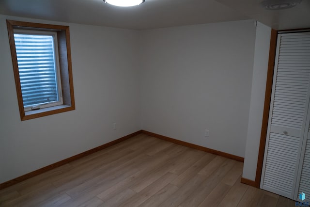 2601 S Glendale Ave, Sioux Falls, SD 57105 - unfurnished bedroom with a closet and light wood-style flooring
