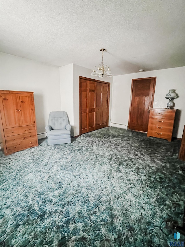 402 E 1st Ave, Beaver Creek, MN 56116 - living area featuring a baseboard heating unit, a chandelier, carpet floors, and a textured ceiling