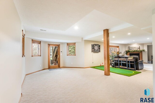5101 S Jasmine Trl, Sioux Falls, SD 57108 - basement featuring carpet floors, a fireplace, and recessed lighting