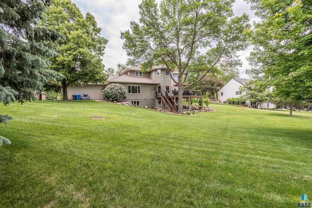 5101 S Jasmine Trl, Sioux Falls, SD 57108 - view of grassy yard with stairway and a wooden deck