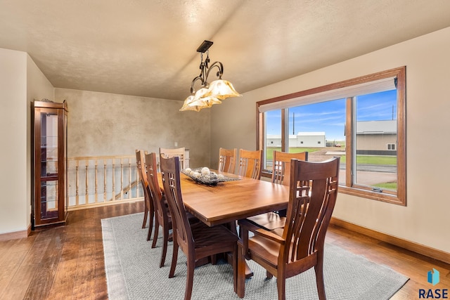 705 Railway St, Canistota, SD 57012 - dining area with wood finished floors and baseboards