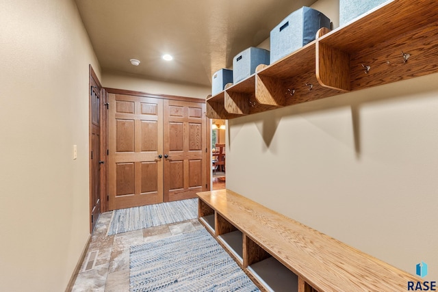 705 Railway St, Canistota, SD 57012 - mudroom featuring recessed lighting and stone finish flooring