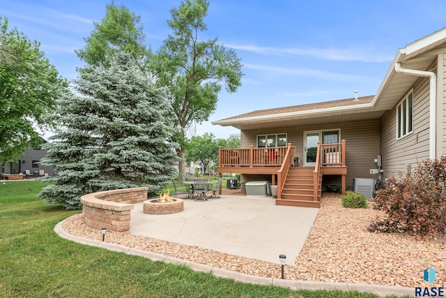 705 Railway St, Canistota, SD 57012 - view of patio / terrace featuring a fire pit and a deck