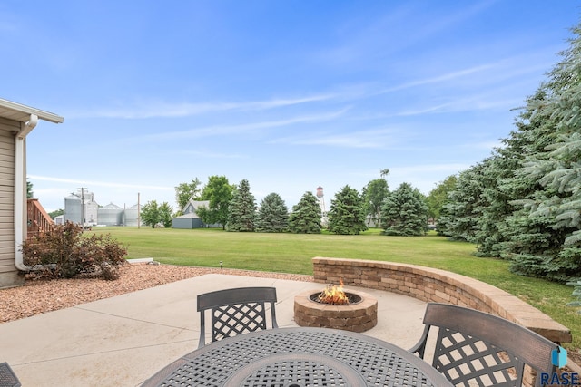 705 Railway St, Canistota, SD 57012 - view of patio featuring an outdoor fire pit