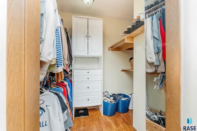 612 E 26th St, Sioux Falls, SD 57105 - walk in closet featuring wood finished floors