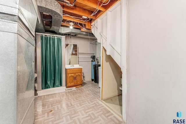 612 E 26th St, Sioux Falls, SD 57105 - unfinished below grade area with a water softener