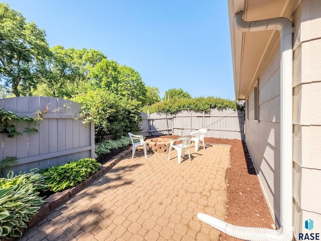612 E 26th St, Sioux Falls, SD 57105 - fenced backyard with a patio area