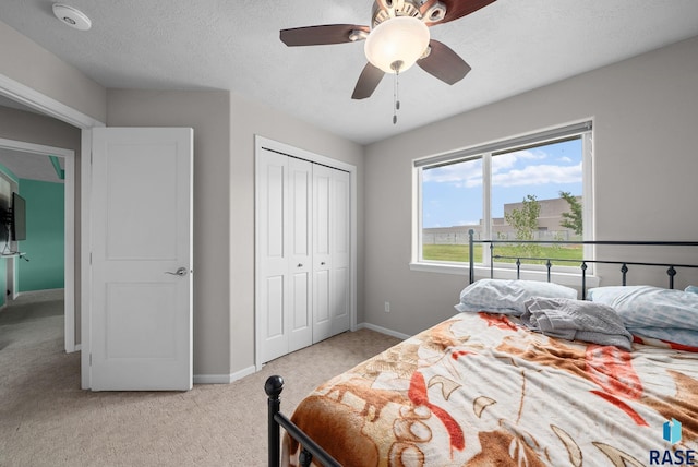 601 W Highpointe St, Tea, SD 57064 - bedroom featuring light carpet, a closet, and ceiling fan