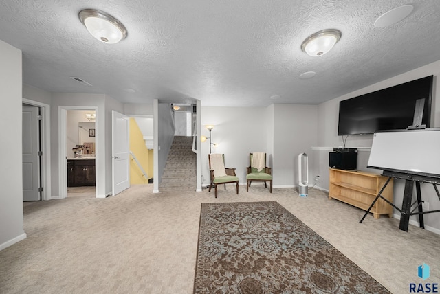 601 W Highpointe St, Tea, SD 57064 - living area with carpet, a textured ceiling, and stairway