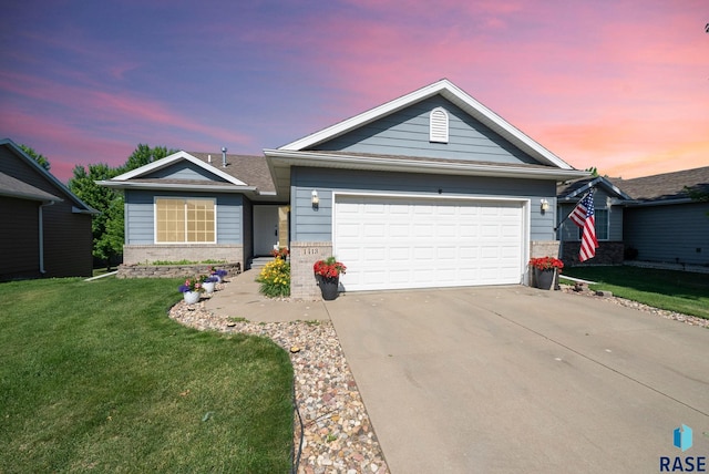 1413 Holbrook Ave, Sioux Falls, SD 57107 - ranch-style house featuring brick siding, concrete driveway, a front yard, and a garage