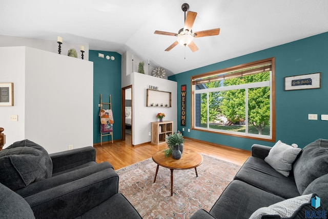 1413 Holbrook Ave, Sioux Falls, SD 57107 - living room featuring wood finished floors, a ceiling fan, and vaulted ceiling
