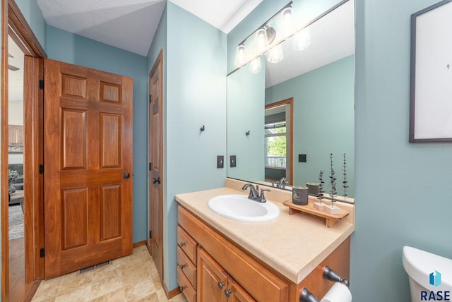1413 Holbrook Ave, Sioux Falls, SD 57107 - bathroom featuring vanity and toilet