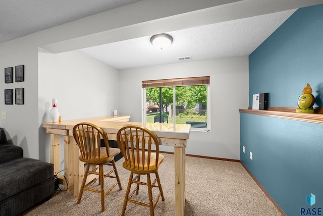 1413 Holbrook Ave, Sioux Falls, SD 57107 - dining room featuring carpet flooring and a bar