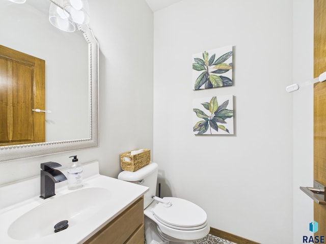 2560 E Meadowside Pl, Sioux Falls, SD 57108 - bathroom featuring vanity and toilet