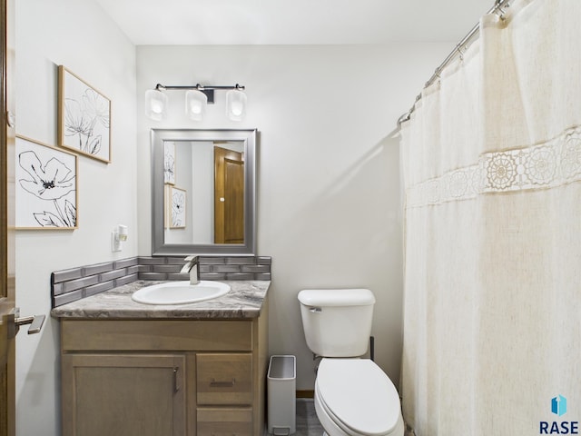 2560 E Meadowside Pl, Sioux Falls, SD 57108 - full bathroom featuring toilet and vanity