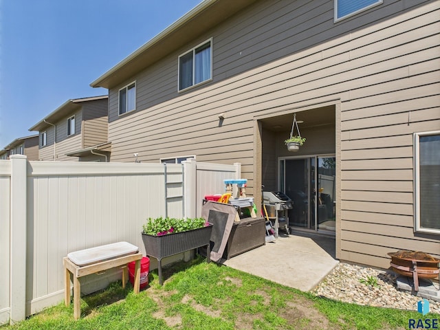 2560 E Meadowside Pl, Sioux Falls, SD 57108 - back of house featuring a patio area