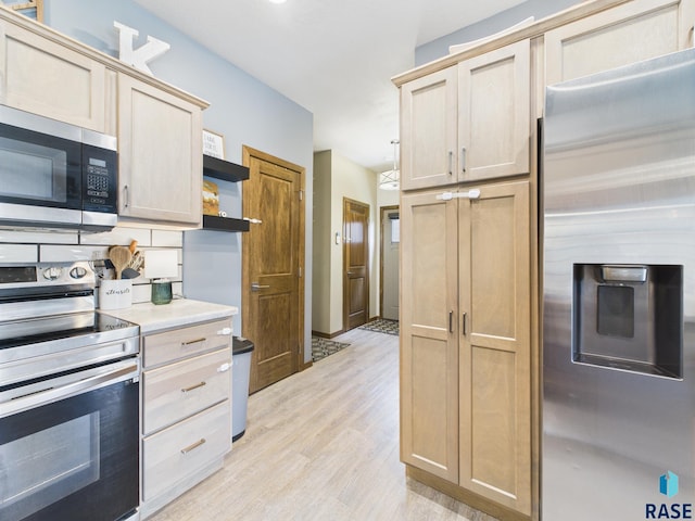 2560 E Meadowside Pl, Sioux Falls, SD 57108 - kitchen featuring stainless steel appliances, open shelves, light wood-type flooring, light countertops, and light brown cabinets