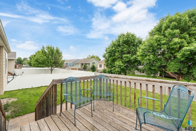 7409 W 51st St, Sioux Falls, SD 57106 - wooden deck with a fenced backyard