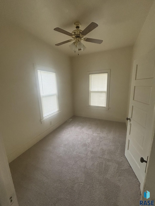 3605 E 12th St, Sioux Falls, SD 57103 - carpeted spare room with a ceiling fan