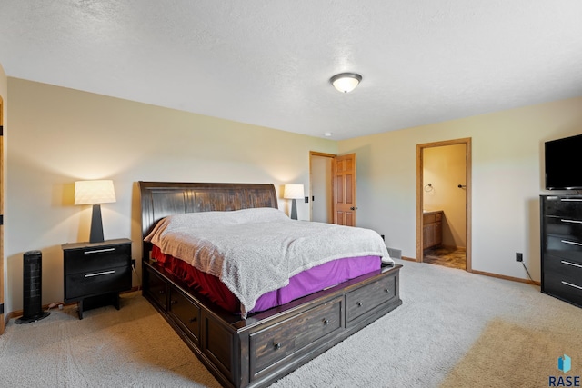 9232 W Norma Trl Unit 2, Sioux Falls, SD 57106 - bedroom with light colored carpet, ensuite bath, and a textured ceiling