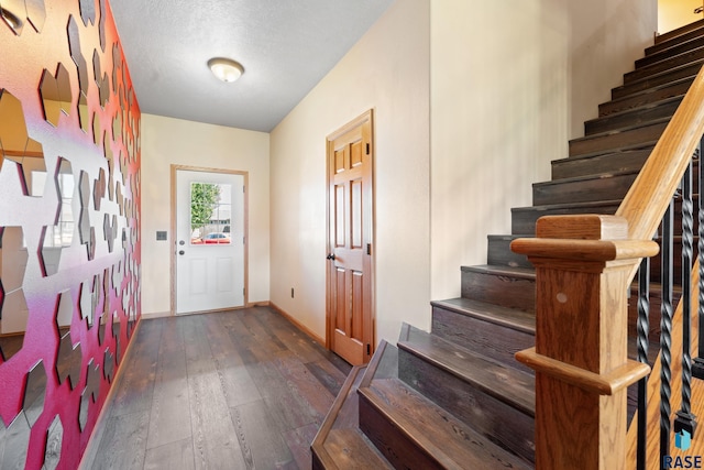 9232 W Norma Trl Unit 2, Sioux Falls, SD 57106 - entrance foyer featuring dark wood-style flooring and stairway