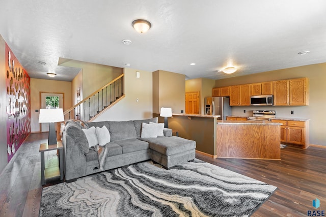 9232 W Norma Trl Unit 2, Sioux Falls, SD 57106 - living room with dark wood finished floors and stairway