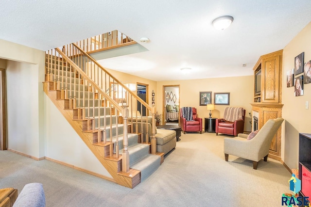 6500 E Split Rock Rd, Sioux Falls, SD 57110 - living room with carpet and stairs