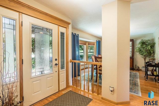 6500 E Split Rock Rd, Sioux Falls, SD 57110 - foyer entrance with wood finished floors