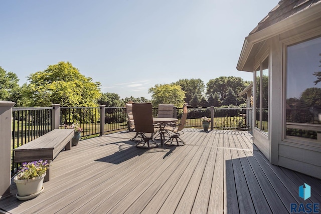 6500 E Split Rock Rd, Sioux Falls, SD 57110 - deck with outdoor dining area