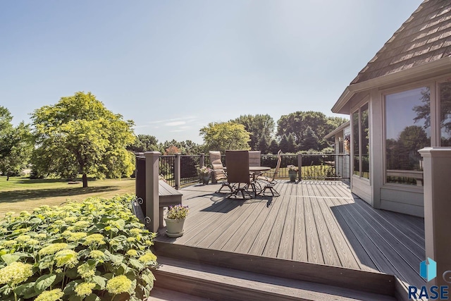 6500 E Split Rock Rd, Sioux Falls, SD 57110 - wooden terrace with outdoor dining area