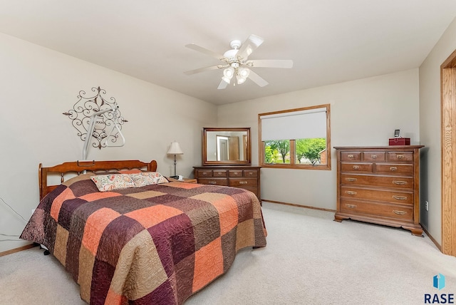 303 E 11th St, Dell Rapids, SD 57022 - bedroom with light colored carpet and ceiling fan