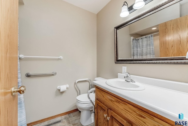 303 E 11th St, Dell Rapids, SD 57022 - bathroom featuring vanity and curtained shower