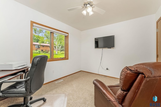 303 E 11th St, Dell Rapids, SD 57022 - carpeted office space featuring baseboards and ceiling fan