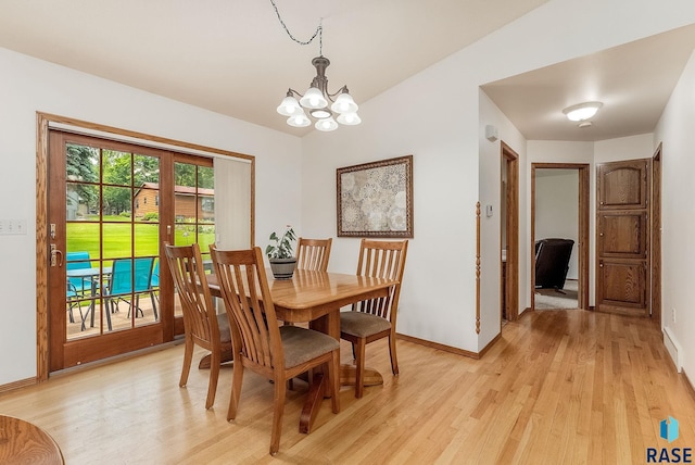 303 E 11th St, Dell Rapids, SD 57022 - dining space featuring a chandelier and light wood finished floors