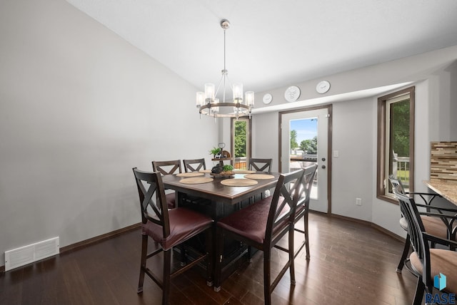 6045 W Jordan Ct, Sioux Falls, SD 57106 - dining room featuring a chandelier, healthy amount of natural light, and wood finished floors