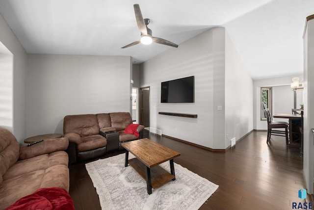 6045 W Jordan Ct, Sioux Falls, SD 57106 - living room with a ceiling fan, dark wood-style floors, and vaulted ceiling