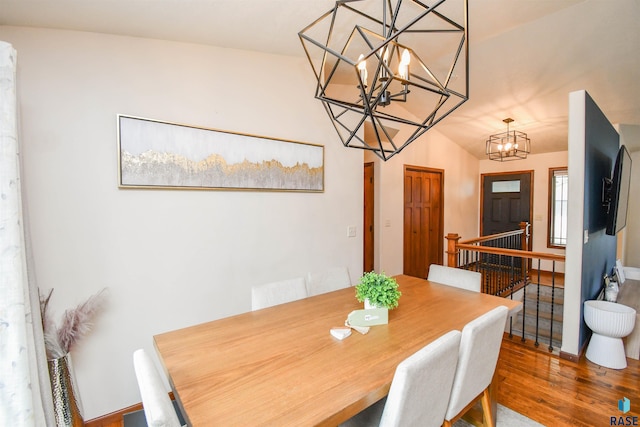 3208 S Triple Play Ave, Sioux Falls, SD 57110 - dining area with a chandelier and wood finished floors
