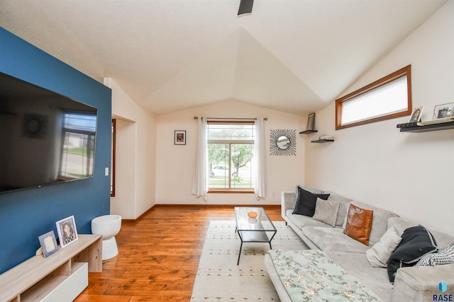 3208 S Triple Play Ave, Sioux Falls, SD 57110 - living area with lofted ceiling and wood finished floors