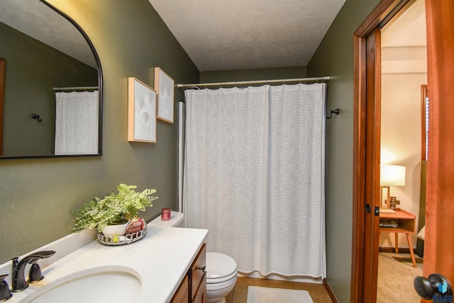 3208 S Triple Play Ave, Sioux Falls, SD 57110 - bathroom with vanity and a textured ceiling