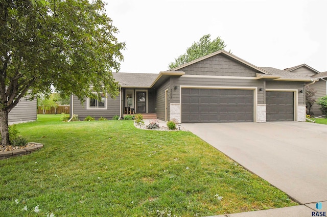 3208 S Triple Play Ave, Sioux Falls, SD 57110 - ranch-style home with a garage, driveway, and a front yard