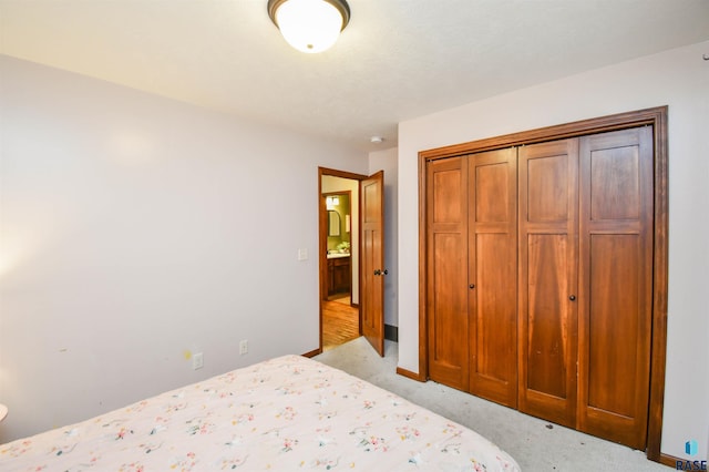 3208 S Triple Play Ave, Sioux Falls, SD 57110 - bedroom with a closet and light colored carpet