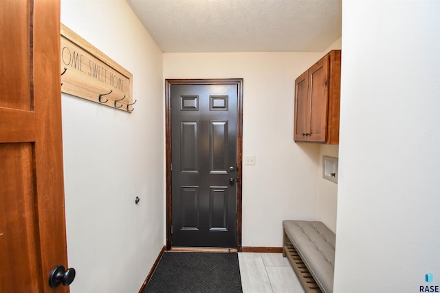 3208 S Triple Play Ave, Sioux Falls, SD 57110 - mudroom featuring baseboards