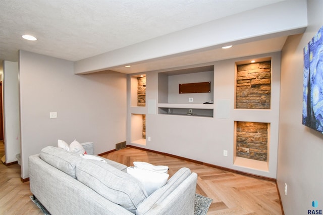 3208 S Triple Play Ave, Sioux Falls, SD 57110 - living area with recessed lighting, built in shelves, and a textured ceiling