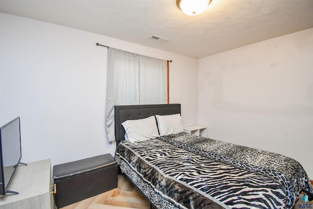 3208 S Triple Play Ave, Sioux Falls, SD 57110 - bedroom with a textured ceiling
