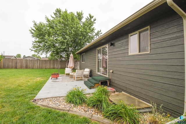 3208 S Triple Play Ave, Sioux Falls, SD 57110 - fenced yard with a patio area