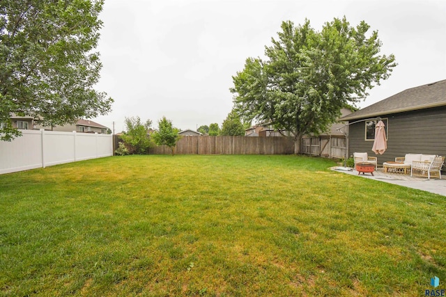 3208 S Triple Play Ave, Sioux Falls, SD 57110 - fenced backyard with a patio